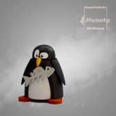 Pinguin mit Fisch